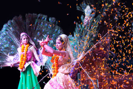 BIKANER, INDIA - JANUARY 13, 2019: Indian Dancers performing Mayur Peakock dance on festival in Rajasthan. Mayur dance is created from an episode of love between Radha and Krishnaのeditorial素材