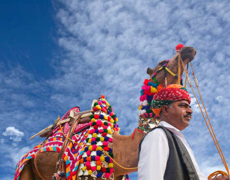 BIKANER, INDIA - JANUARY 12, 2019: Indian Rajasthani man in traditional clothes poses for a photo during Camel Festival in Rajasthanのeditorial素材