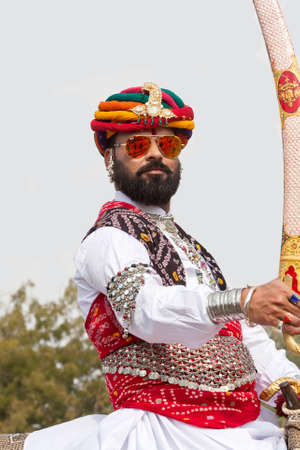 BIKANER, INDIA - JANUARY 12, 2019: Indian Rajasthani man poses for a photo during Camel Festival in Rajasthan stateのeditorial素材