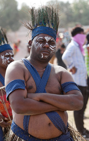 BIKANER, INDIA - JANUARY 12, 2019: Indian man from Nagaland in traditional costume poses for a photo...