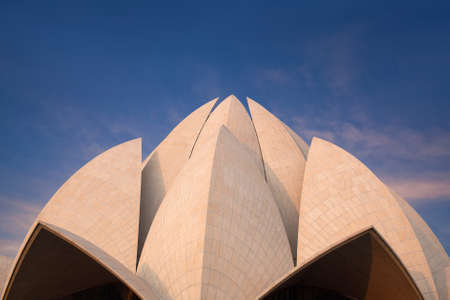 Exterior of Lotus Bahai Temple at sunset in Delhi, India. The structure is made up of pure white marble. Notable for its flowerlike shape, it has become a prominent attraction in Delhi.のeditorial素材