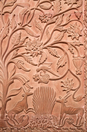 Ancient stone bas-relief with flowers and animals in Junagarh fort in Bikaner, Rajasthan, Indiaのeditorial素材