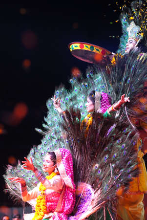 BIKANER, INDIA - JANUARY 13, 2019: Indian Dancers in traditional clothes performing Mayur Peakock dance at festival in Rajasthan state. Mayur dance is created from an episode of love between Radha and Krishna.のeditorial素材