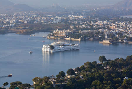 Panoramic aerial view of Udaipur City Palace, Taj Lake Palace and Pichola lake in Udaipur, Rajasthan state, Indiaのeditorial素材