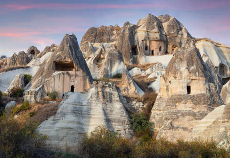 Unique geological formations in Cappadocia, Central Anatolia, Turkey. Cappadocian Region with its valley, canyon, hills located between the volcanic mountains Erciyes, Melendiz and Hasan.の写真素材