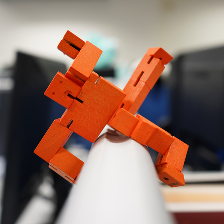 Orange cube robot toyの写真素材