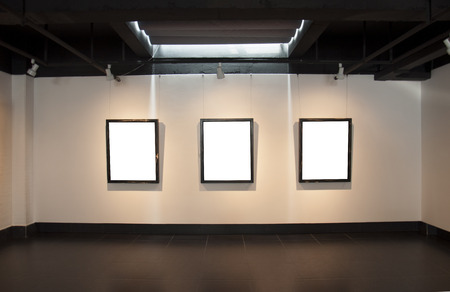 blank painting frame in the galleryの写真素材