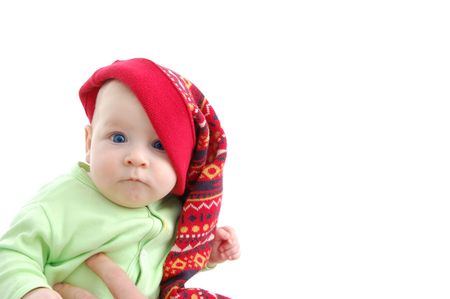 a little baby in a large red hut portrait isolated on whiteの写真素材