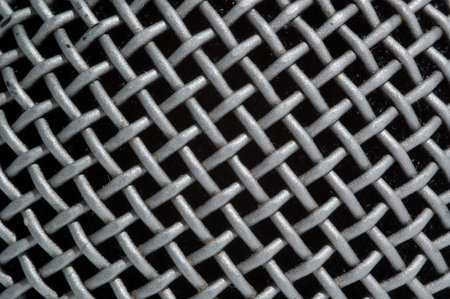 gray glitter metallic grating, close-up, black backgroundの写真素材