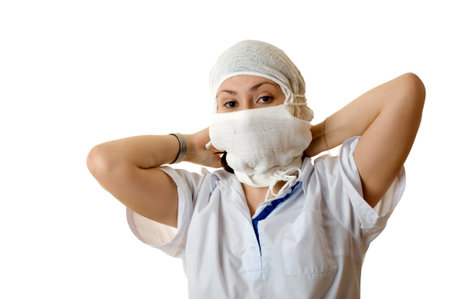 The doctor going to operation. Isolated on white backgroundの写真素材