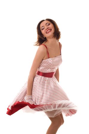 Dance. Fantastic positive girl in retro dress. Isolated over whiteの写真素材
