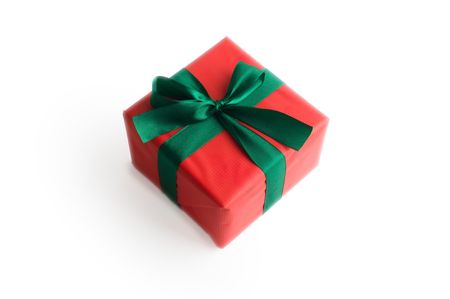 Close-up xmas gift over golden stars backgroundの写真素材