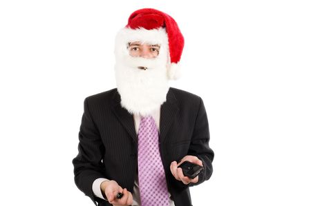 Businessman in suit with santa hat on head. Isolated over white backgroundの写真素材