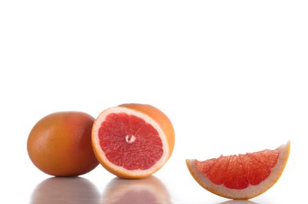 Small group of grapefruits isolated on white backgroundの写真素材