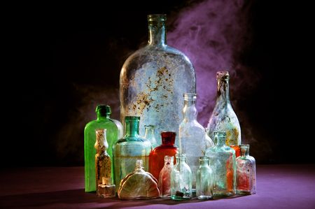 Magic bottles on darkの写真素材