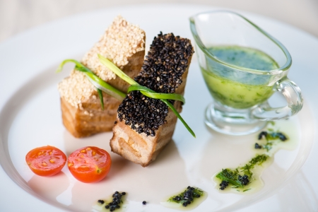 baked meat dish it is tied up by onionsの写真素材