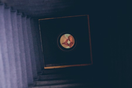 Close-up of a couples kiss, filmed a vintage cameraの写真素材