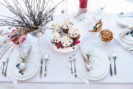 Simple festive Easter table setting with napkin Easter Bunny and pussy willowの写真素材