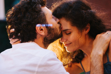 Beautiful middle-aged couple in love is enjoying each other with sexual passion and affection in the...