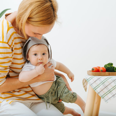 Active restless infant child is presented food