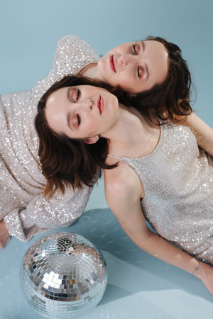 The concept of sisterhood, the girls feel togetherness and kinship, they put their heads on each...