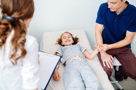 Father and daughter came to female doctor for ultrasound examination.