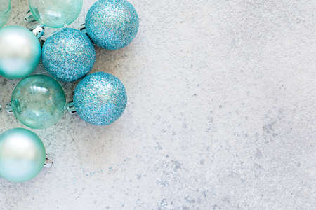 Christmas blue balls (decorations for the Christmas tree, toys) on a blue background. Festive mood, new year.の写真素材