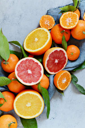 Citrus fruits orange, lemon, grapefruit, mandarin, lime. Fresh fruits. Mixed fruits background. Healthy eating, dieting, healthy breakfast. Background of healthy fresh fruits.の写真素材