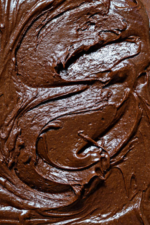Chocolate texture (mousse, ganache) with pieces of chocolate drops. Raw dough for making American...
