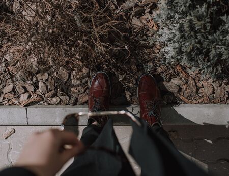 Fashionable autumn red patent leather bootsの写真素材