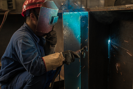 Welding work issued strong dazzling rays of light - Stock Image ...