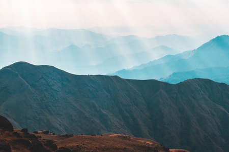 Top View Mulayit Taung golden light of the morning sun and the mist covered on Mount Mulayit,Myanmar