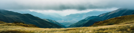 Panoramic view of mountains in clouds. Caucasus. Russia.