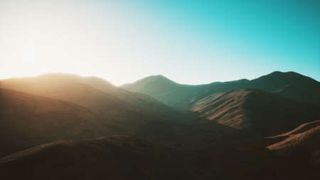 hills with rocks at sunset