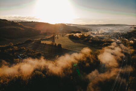 natural landscape with a view from a height of a cloud forest along a sunny road