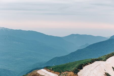 Beautiful landscape, mountains, snow on top in summer. Travel, vacation concept