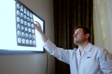 Portrait of a doctor with roentgenogram - Stock Image - Everypixel